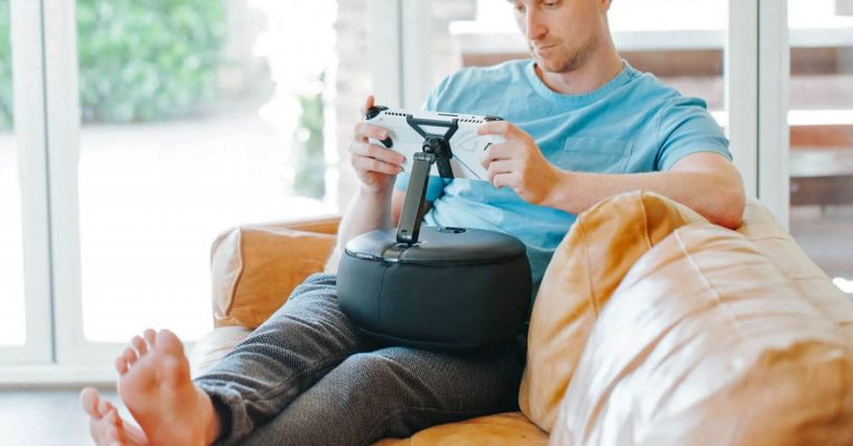 Let this tiny bean bag chair for your lap hold your heavy handhelds