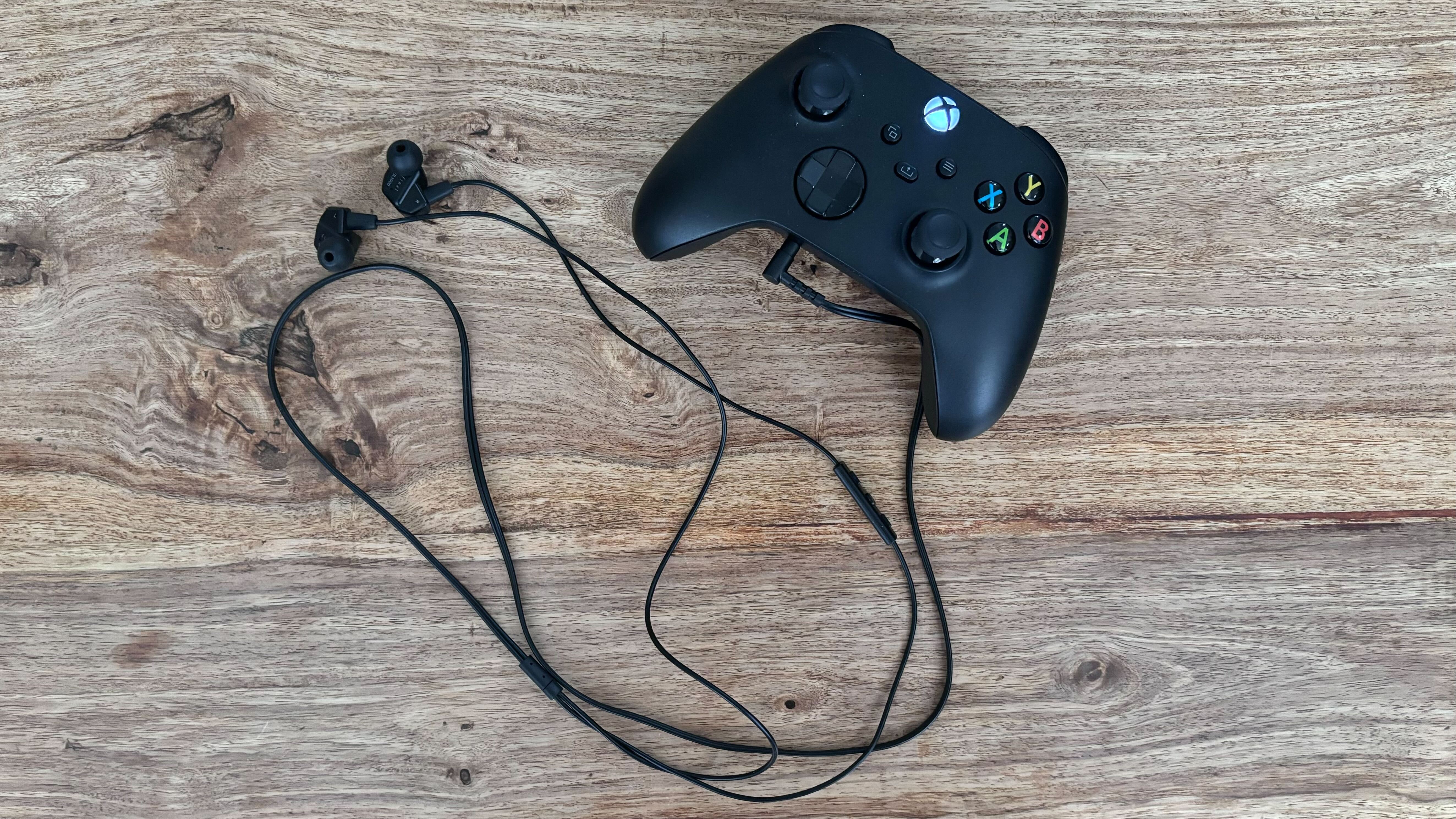 The Final VR3000 earbuds plugged into an Xbox Wireless Controller.